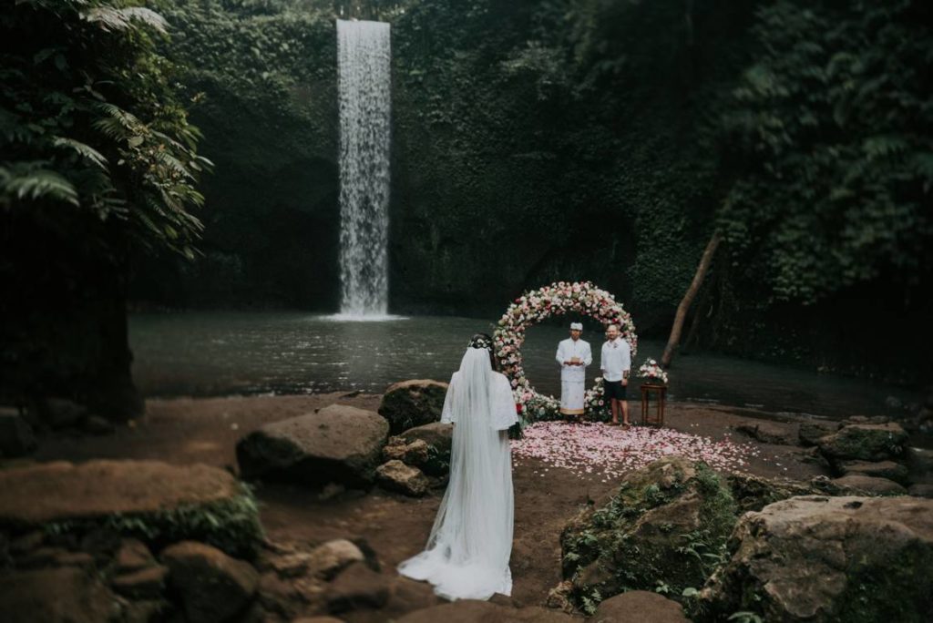 Bali waterfall wedding organized by Bali Moon Wedding