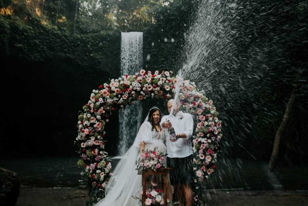 Bali waterfall wedding organized by Bali Moon Wedding
